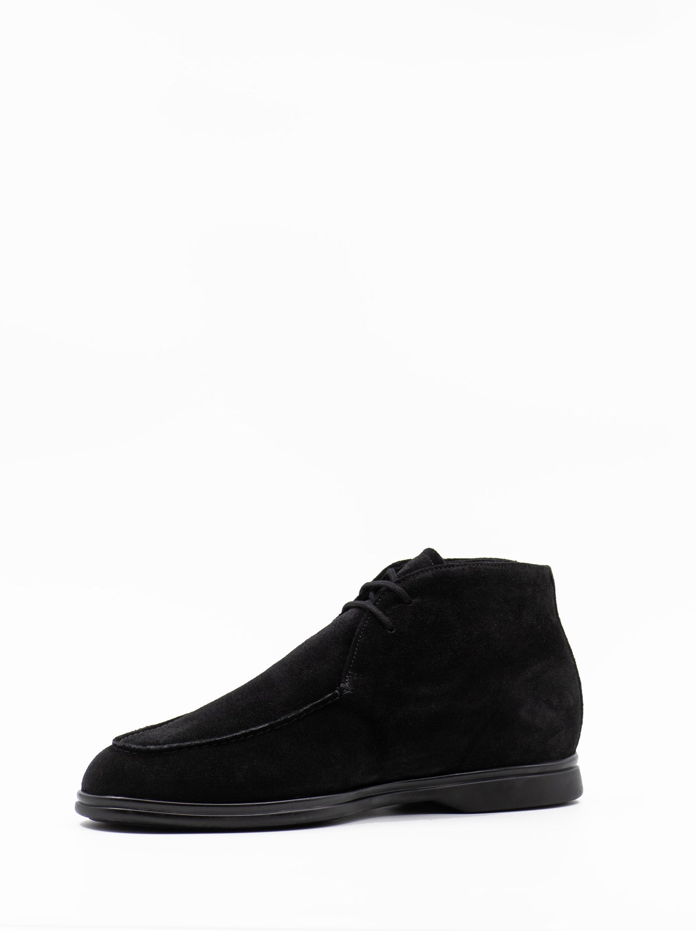 Shearling-lined boots in black suede 