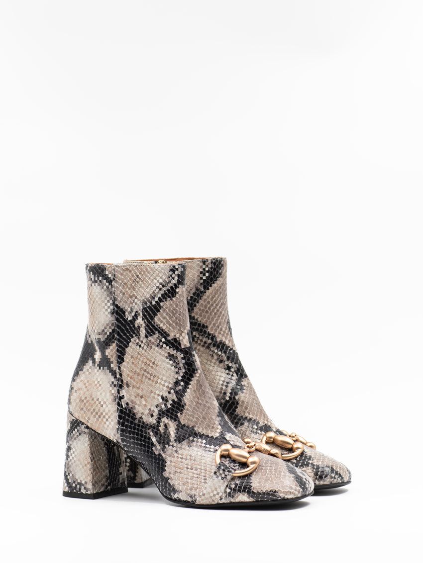 Horsebit animal print ankle boots