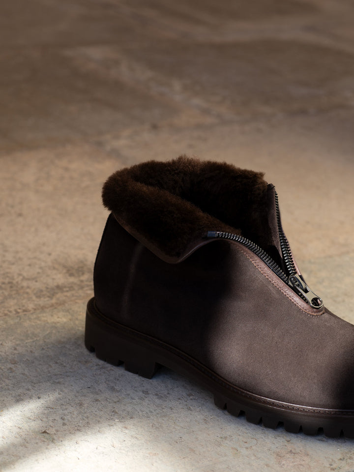 Zip front shearling lined ankle boots in brown suede MarZio