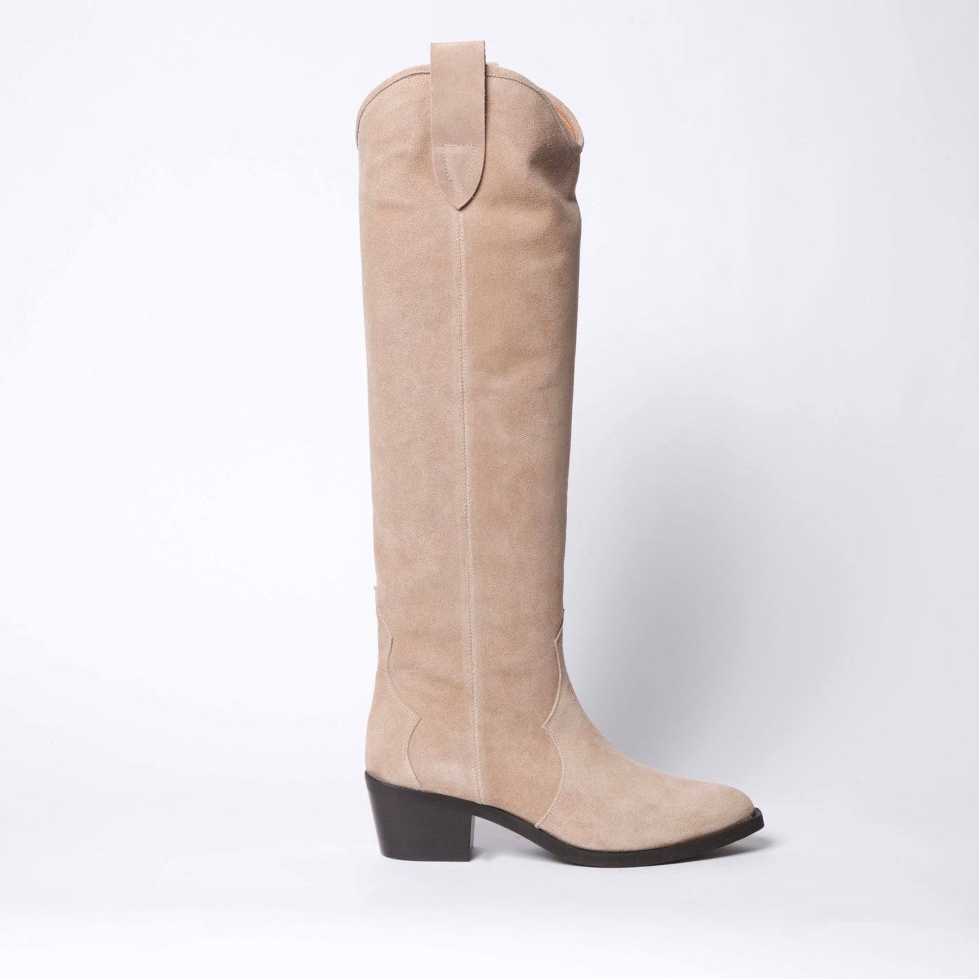 Cowboy boots in beige suede leather. 