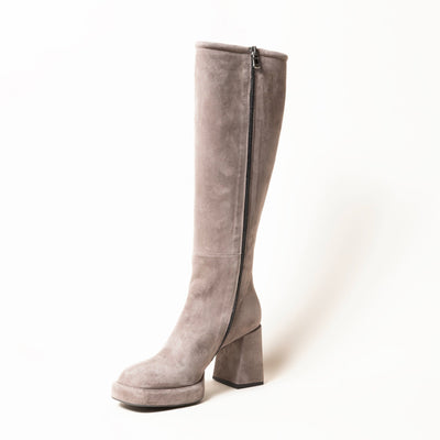 Taupe platform heeled knee high boots.